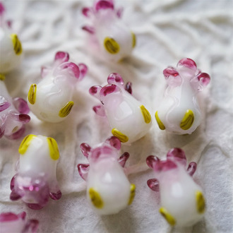 透玫瑰粉渐变可爱花苞珠直孔~日本进口灯工玻璃琉璃珠 尺寸约17X12MM