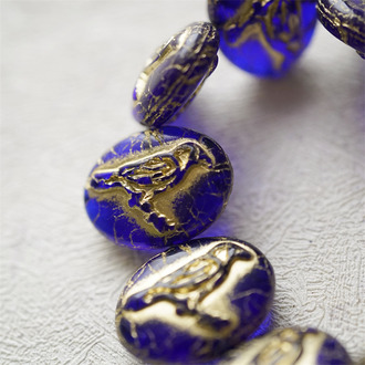幽幽宝石蓝描金色~惊鸿鸟浮雕椭圆捷克珠玻璃琉璃珠 22X16MM